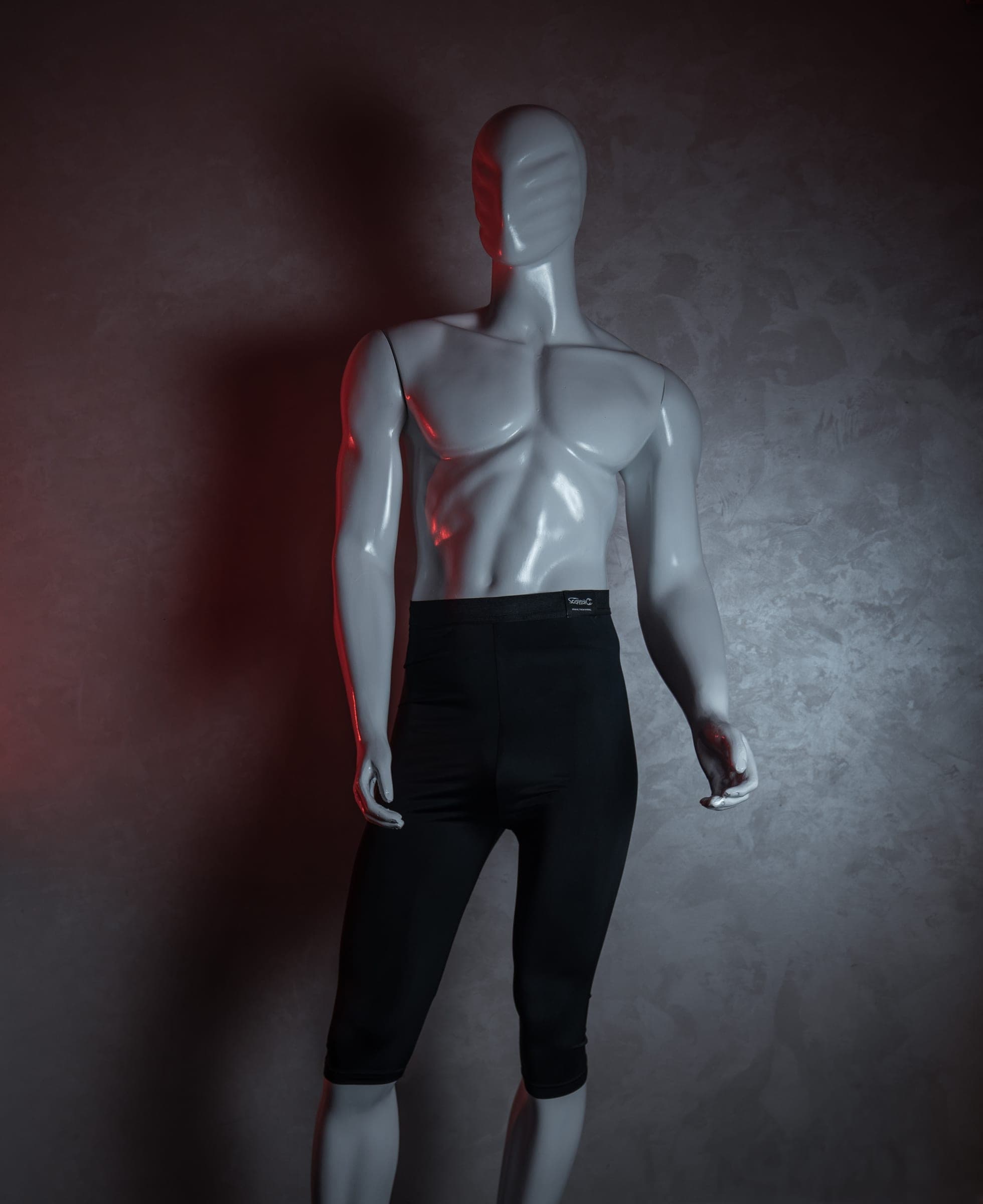 The Awrah Cover on a mannequin, navel to knee, under red light